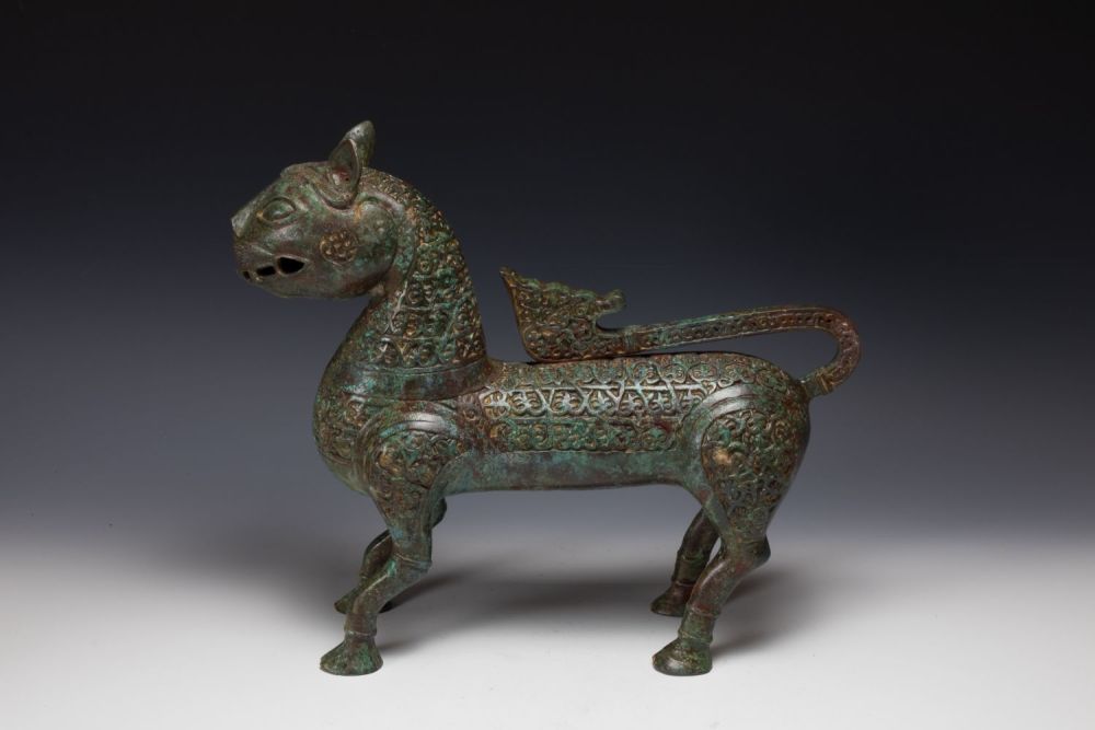 Lot 369: A Large Chinese Islamic Bronze Lion with Intricate...