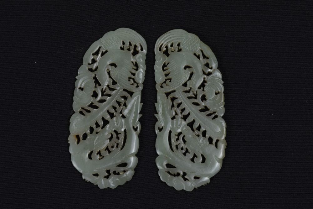 Lot 382: A Pair of Chinese Jade Accessories Used for...