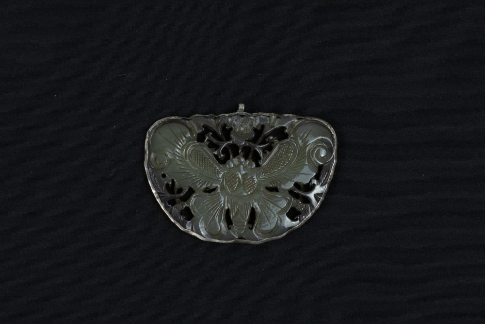 Lot 383: A Chinese Jade & Silver Pendant in the...