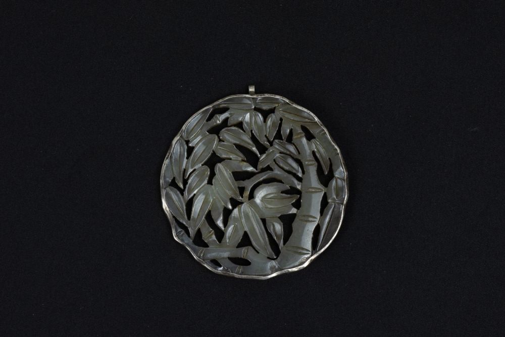 Lot 385: A Chinese Jade & Silver Pendant Depicting a...