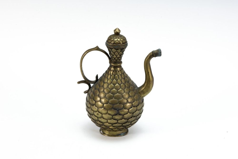 Lot 390: A Chinese Brass Jug from the 19th Century...