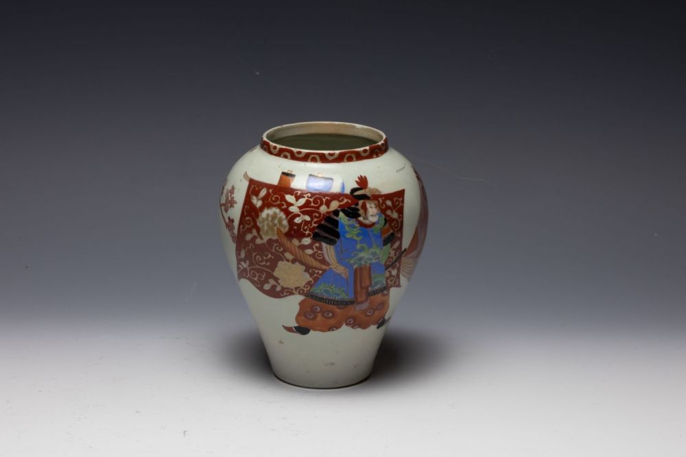Lot 392: A Japanese Porcelain Vase from the 19th Century...