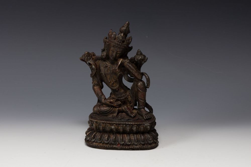 Lot 396: A Tibetan Bronze Gilted Buddhist Figure of Guan...