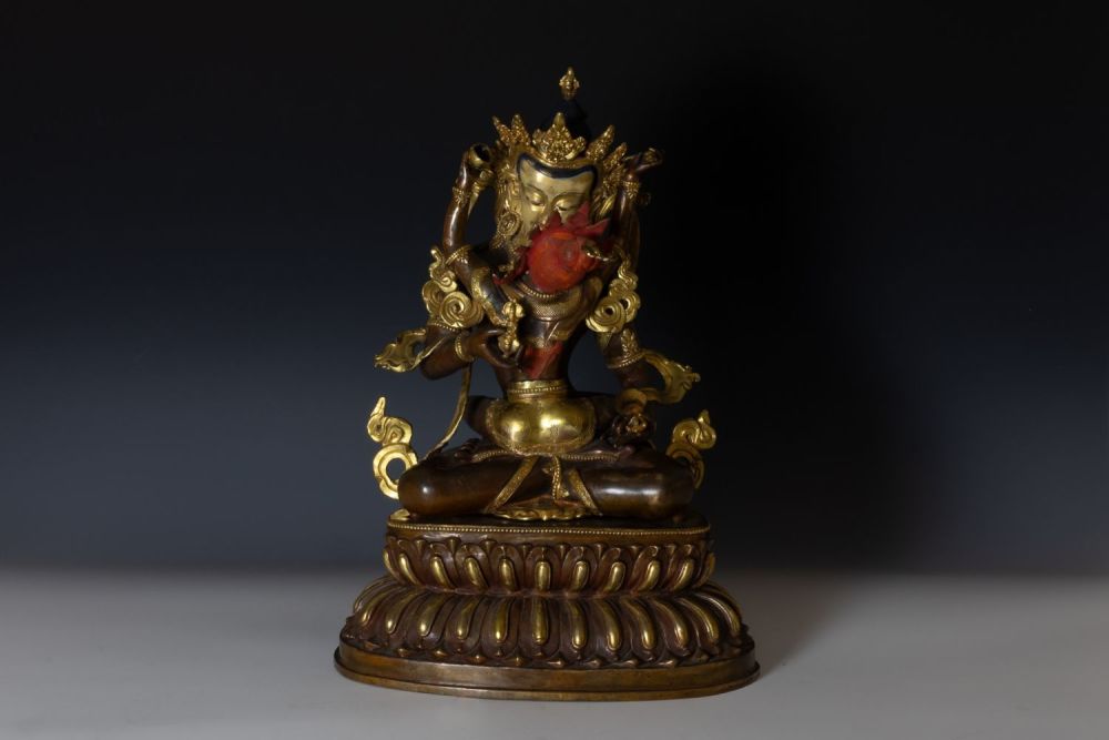 Lot 399: A Large Tibetan Bronze Figure of Vajrasattva.