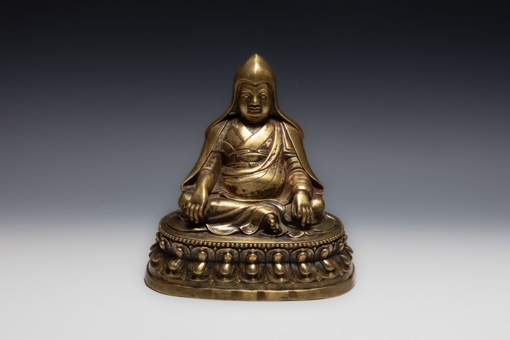 Lot 400: A Rare Tibetan Bronze Buddhist Statue.