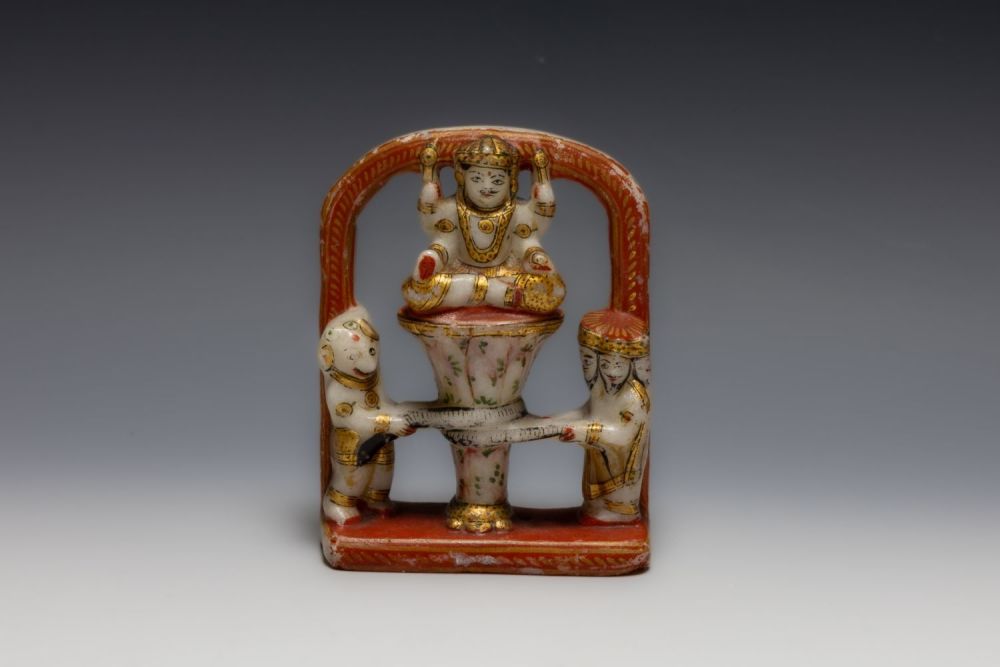 Lot 407: An Indian Alabaster Figure of a Deity and...