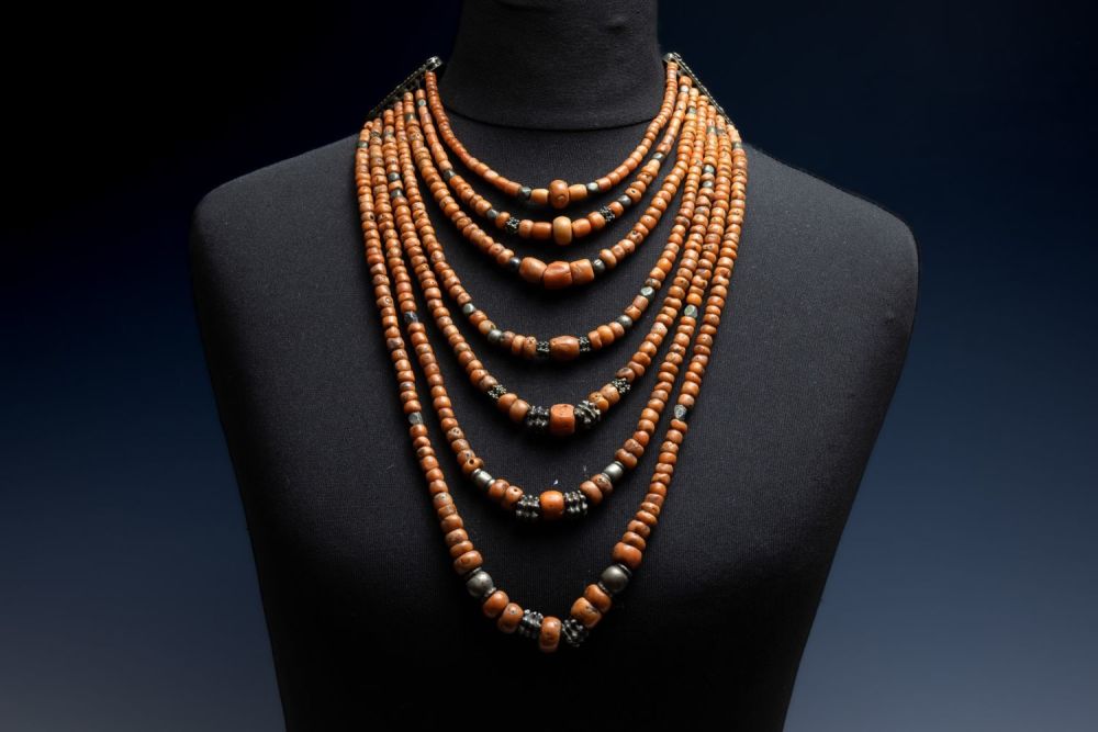 Lot 433: A Tribal Yemini Coral and White Metal Necklace...