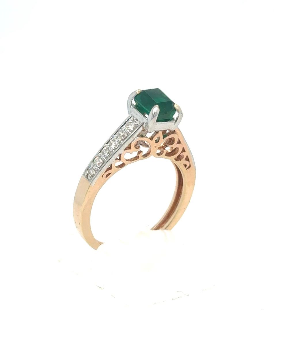Lot 436: An Emerald and Diamond Ring in Rose and...