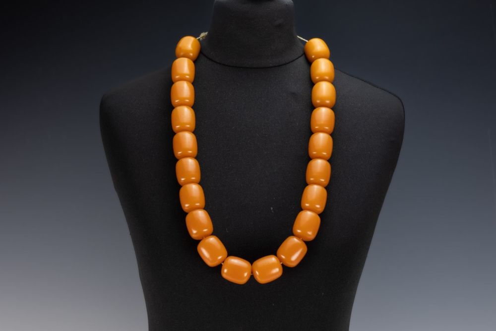 Lot 457: A Tribal Yemeni Amber Colour Beads Necklace.