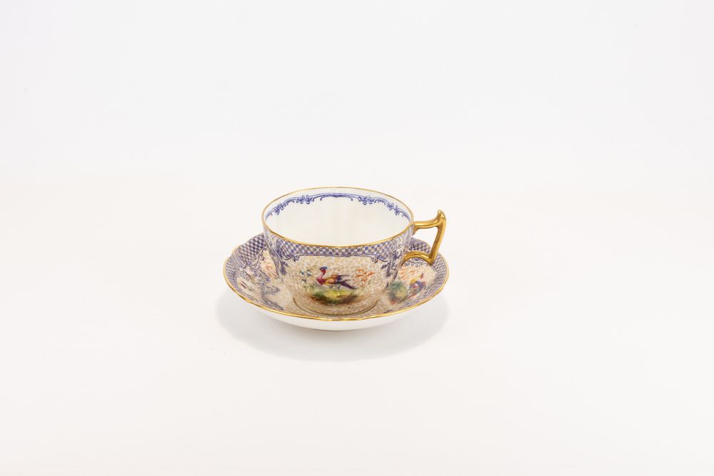 Lot 16: A Victorian Doulton Porcelain Cup & Saucer.