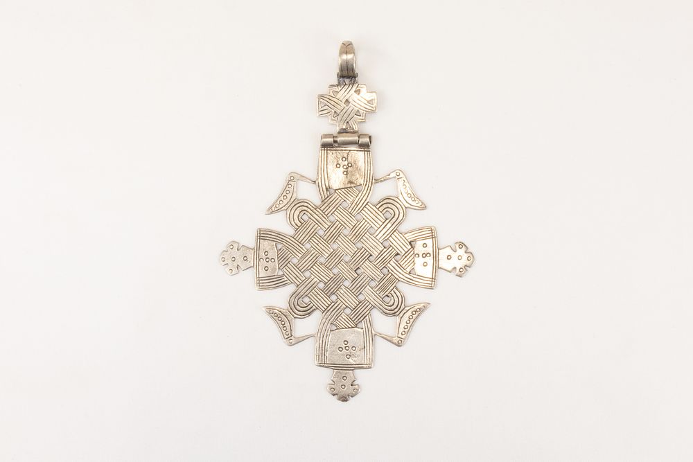 Lot 61: A Tribal Ethiopian Coptic Silver Cross Pendant from...