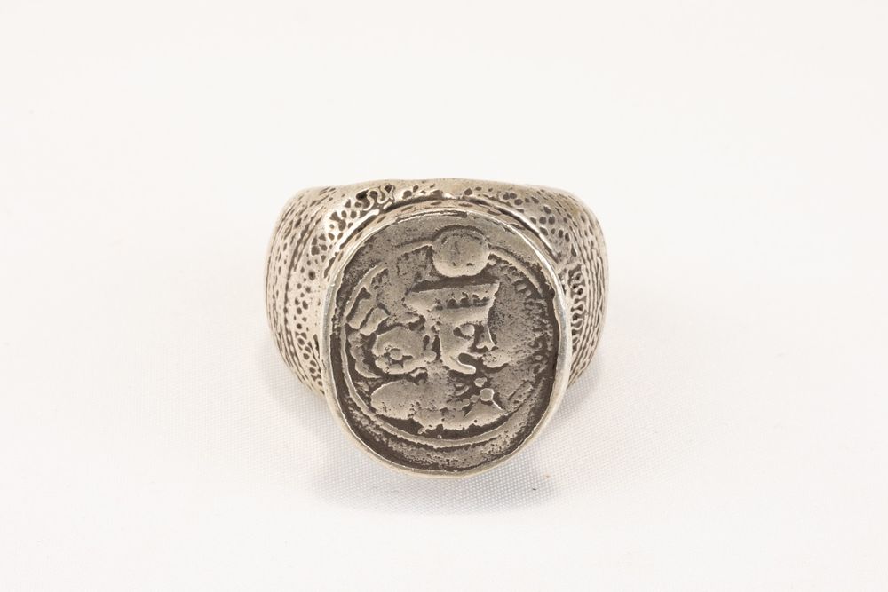 Lot 63: An Islamic Tribal Turkmen Silver Ring with a...