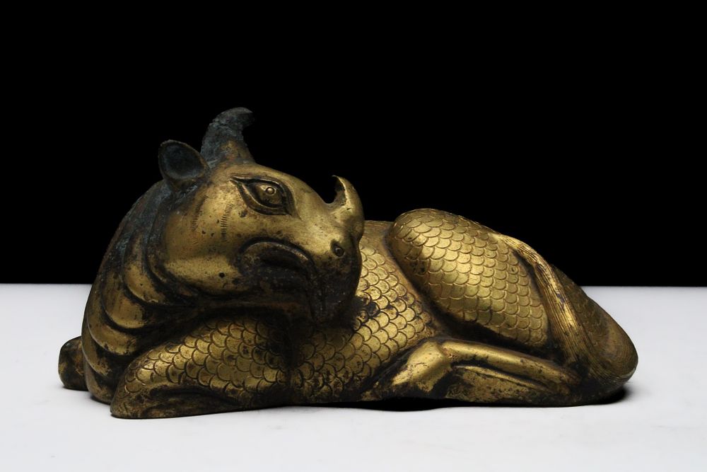 Lot 81: A Chinese Gold Gilt Bronze Figure of a...