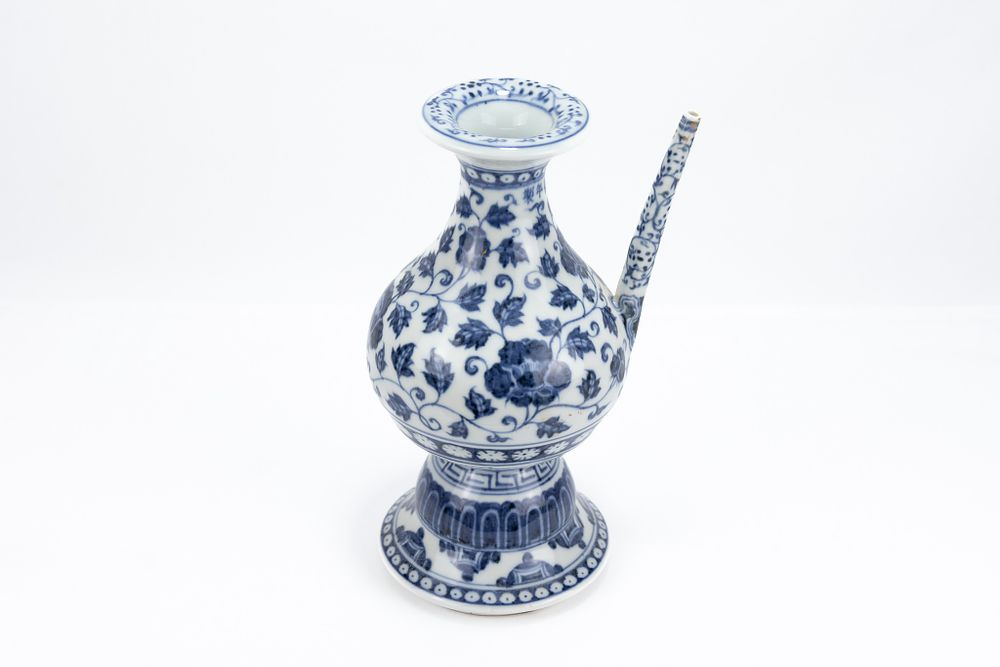 Lot 88: A Chinese Porcelain Blue & White Ewer Decorated...