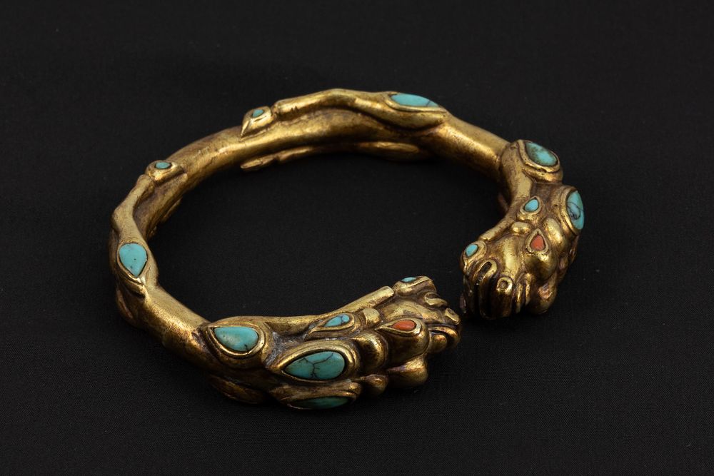 Lot 92: A Chinese Tibetan Gilt Bangle Depicting 2 Lions...