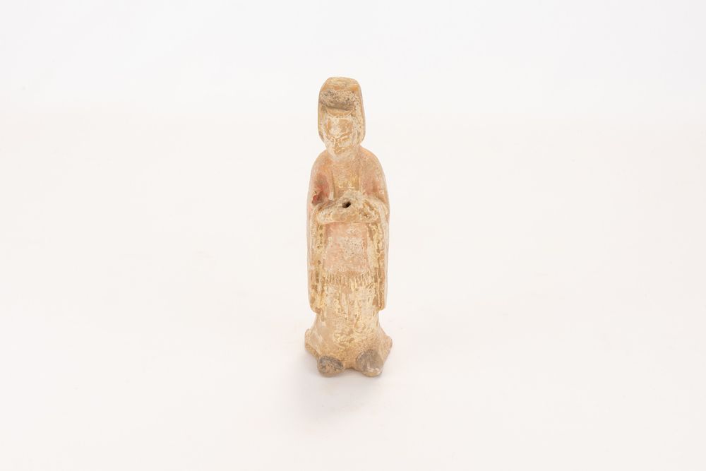 Lot 112: A Chinese Pottery Female Figure in a Long...