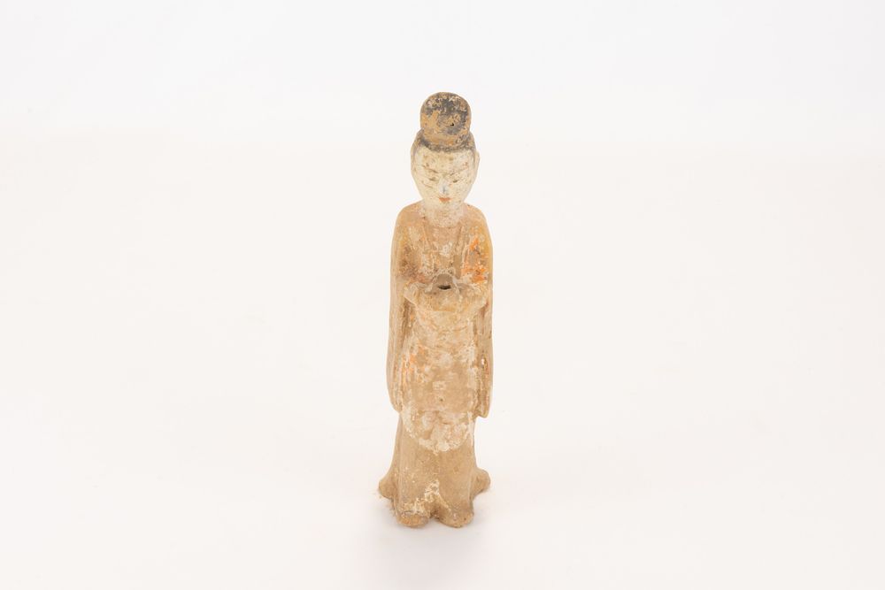 Lot 113: A Chinese Pottery Female Figure in a Long...