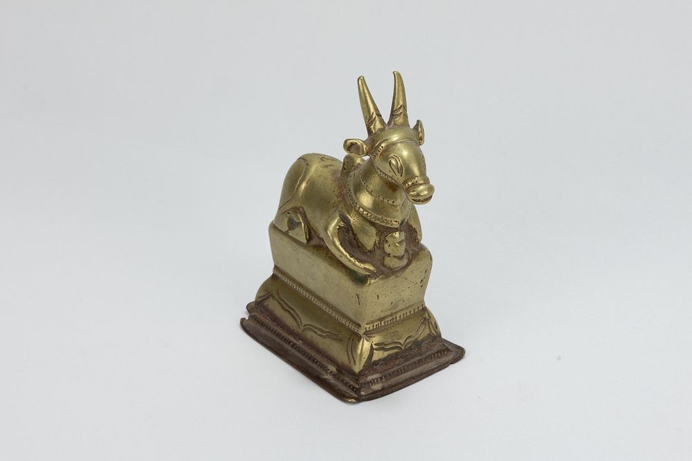 Lot 117: An Indian Bronze Figure of Nandi Sacred Cow...