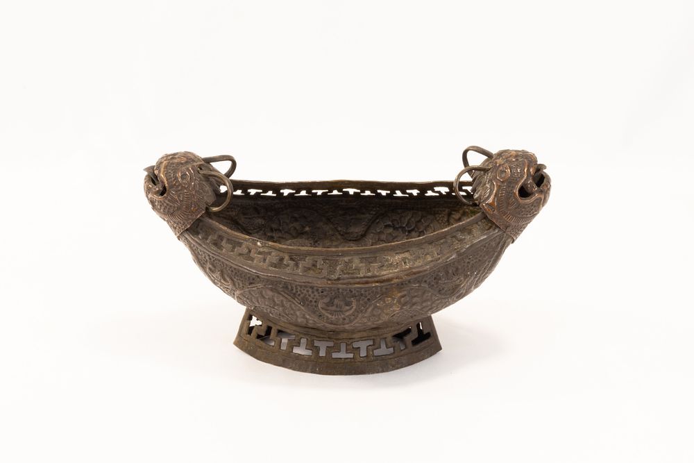 Lot 137: An Indian Kashmiri Copper Kashkul Beggar's Bowl Decorated...