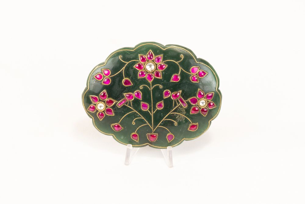Lot 140: An Indian Mughal-Style Green Jade Pendant Decorated with...