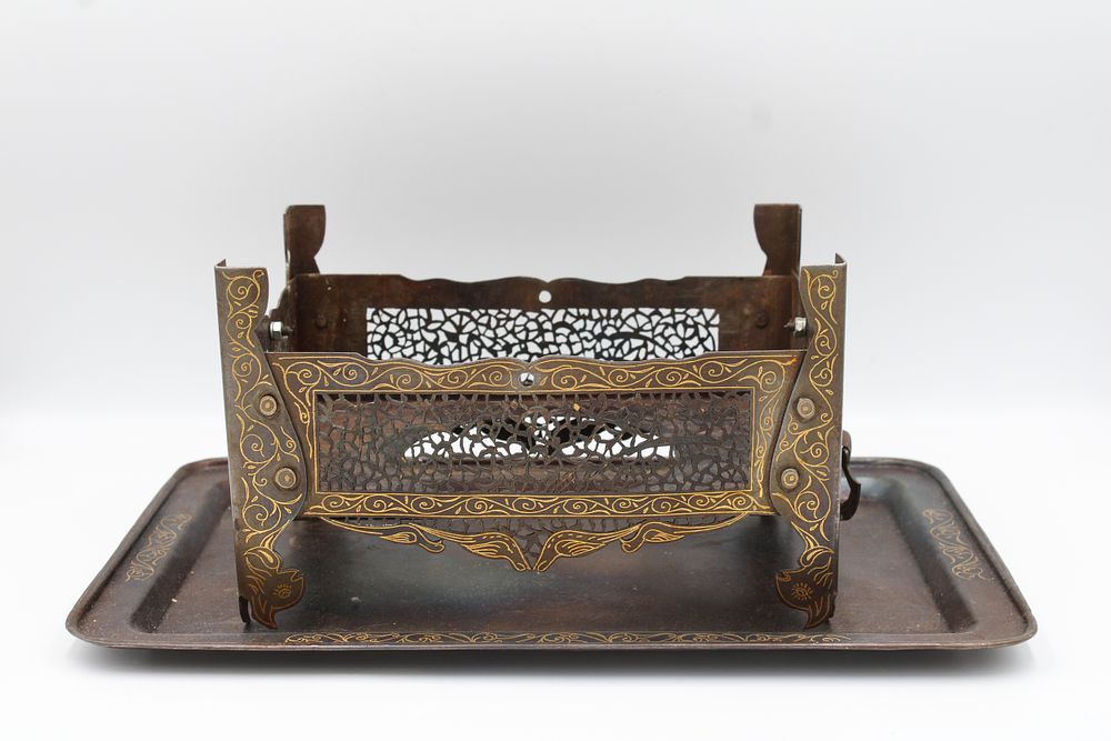 Lot 152: A Persian Coal Burner with Intricate Gold Inlay...