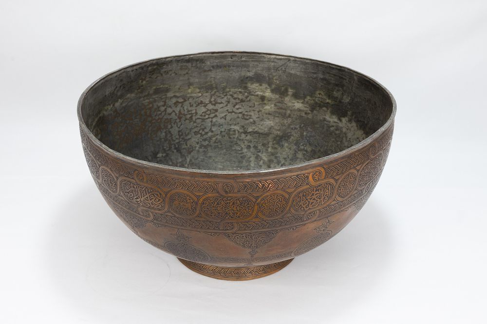 Lot 164: An Islamic Middle Eastern Large Copper Bowl with...