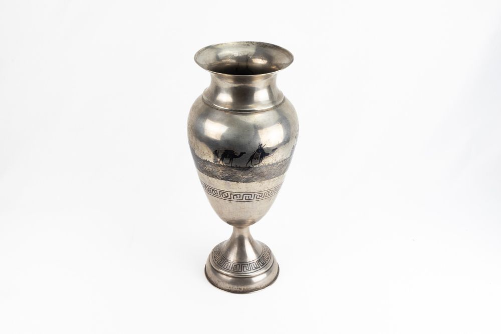 Lot 180: An Unusual Large Iraqi Niello-Silver Vase Decorated with...