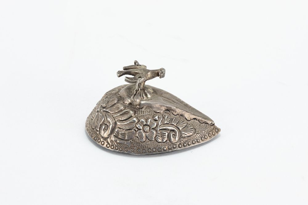 Lot 215: An Islamic Ottoman Silver Hammam Feet Scraper from...