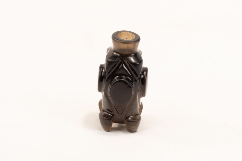 Lot 225: An Islamic Crystal Bottle with Intricate Carvings Probably...