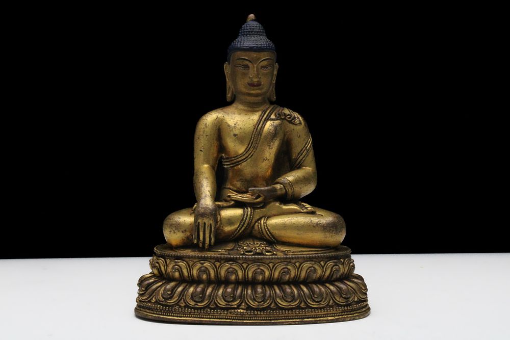 Lot 253: A Fine Tibetan or Nepalese Bronze Gilt Buddhist...