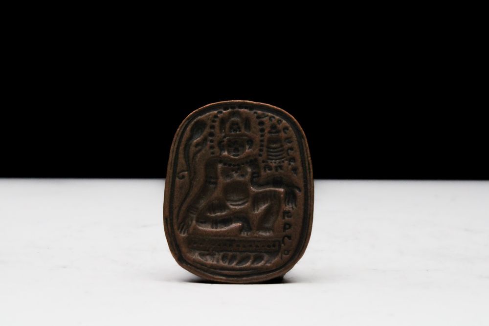 Lot 254: A Chinese Tibetan Miniature Buddha Tsa Tsa Mold.