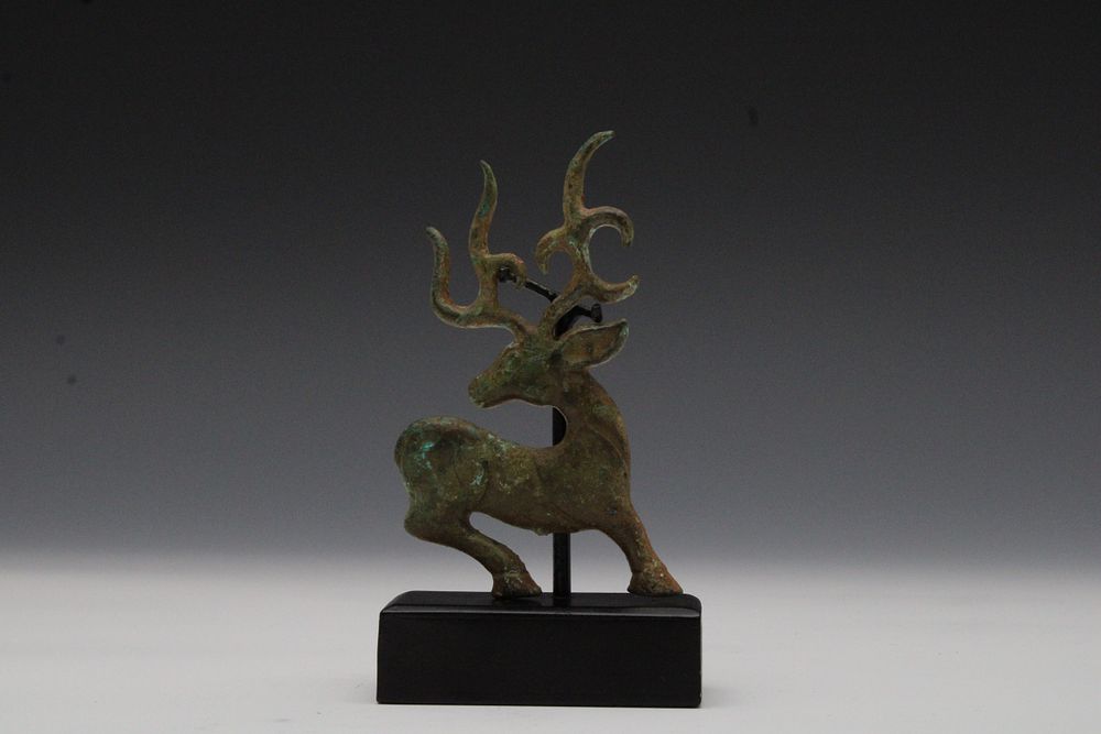 Lot 272: A Luristani Bronze Plaque in the Shape of...