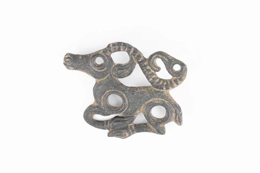 Lot 283: A Luristani Bronze Plaque in the Figure of...