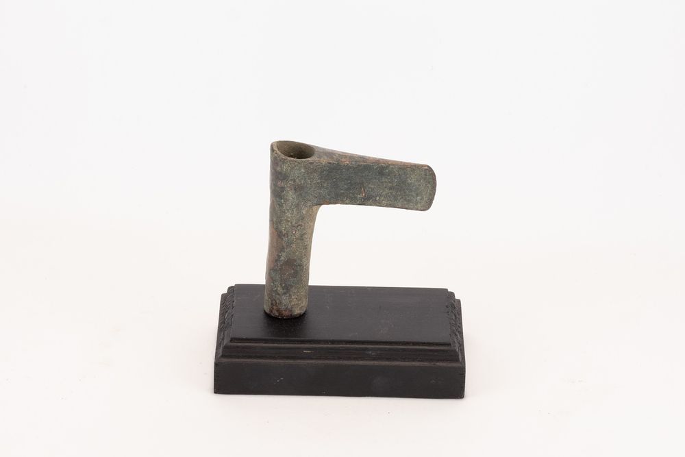 Lot 301: A Luristani Bronze Axe Head Circa 1200-700 BC.