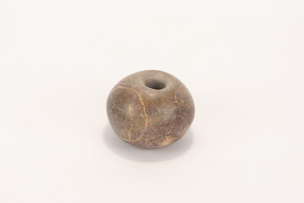 Lot 303: A Bactrian Stone Mace Head from the Early...