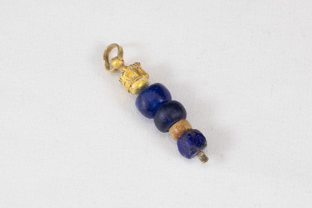 Lot 311: A Western Asiatic Gold & Glass Pendant Circa...