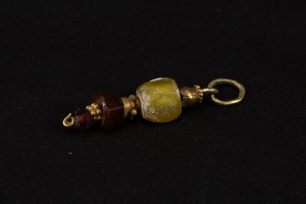 Lot 317: A Western Asiatic Gold Pendant with Glass, Jasper...