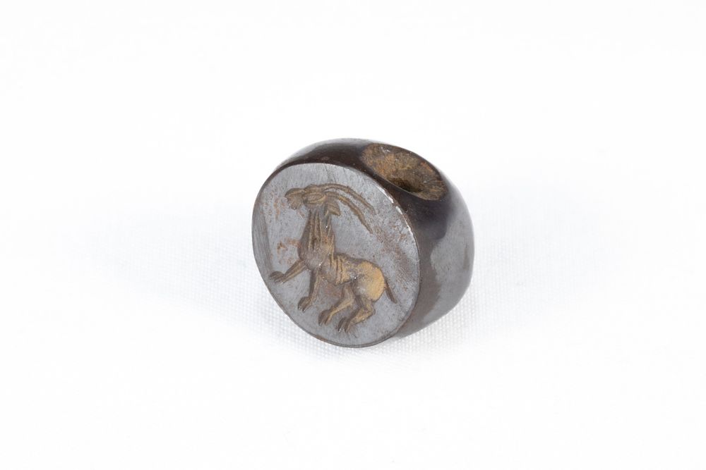 Lot 330: A Sassanian Hematite Stamp Seal with Zoomorphic Figure...