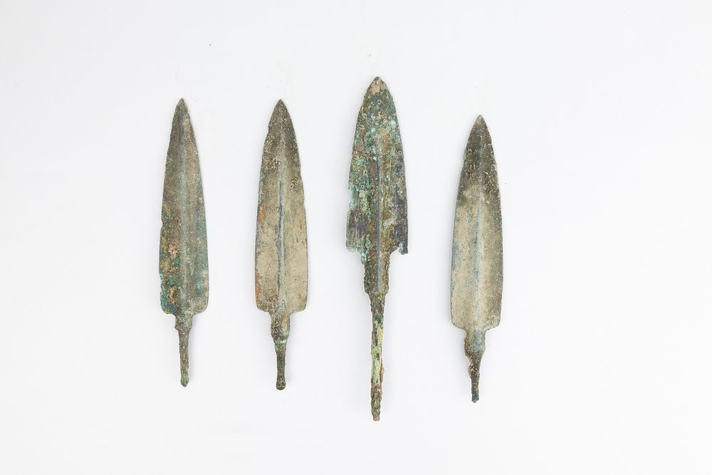 Lot 354: A Lot of 4 Luristani Bronze Daggers.