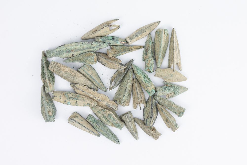 Lot 356: A Lot of 30 Luristani Bronze Daggers.
