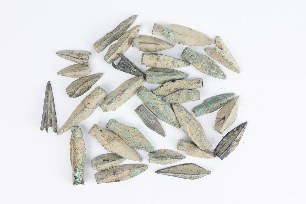 Lot 357: A Lot of 30 Luristani Bronze Daggers.