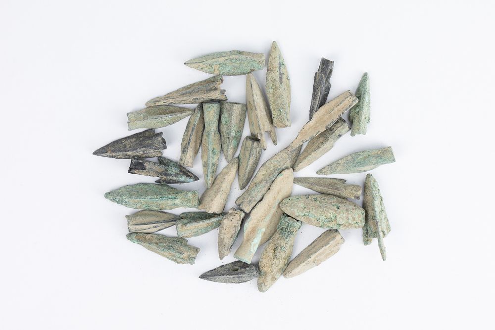 Lot 358: A Lot of 30 Luristani Bronze Daggers.