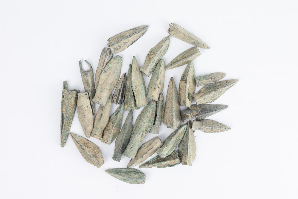 Lot 359: A Lot of 30 Luristani Bronze Daggers.