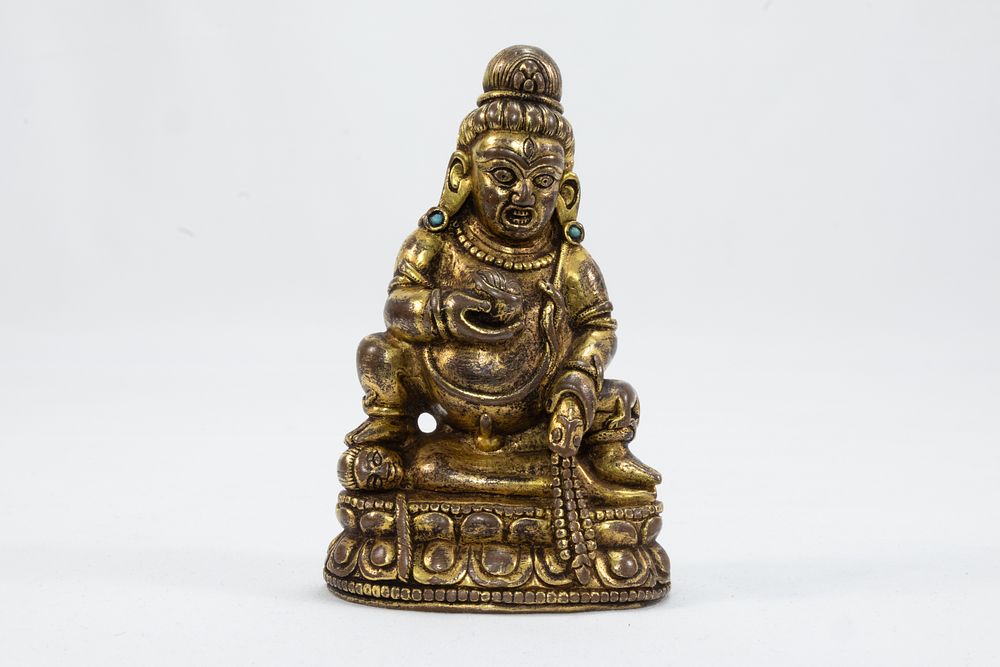 Lot 45: A Tibetan Bronze Gold Gilt Figure of Jambhala...