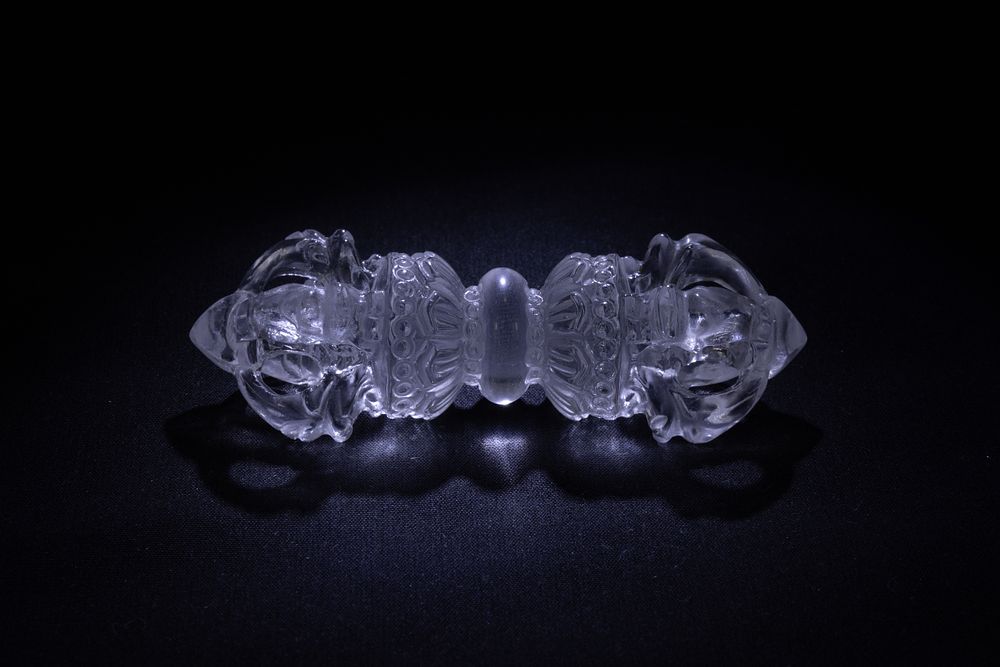 Lot 59: A Tibetan Hand-Carved Crystal Vajra.