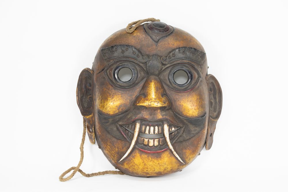 Lot 63: A Tribal Tibetan Bronze Buddhist Wall Hanging Mask...