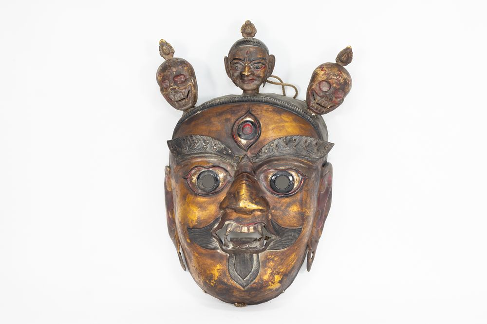 Lot 65: A Tribal Tibetan Bronze Buddhist Wall Hanging Mask...