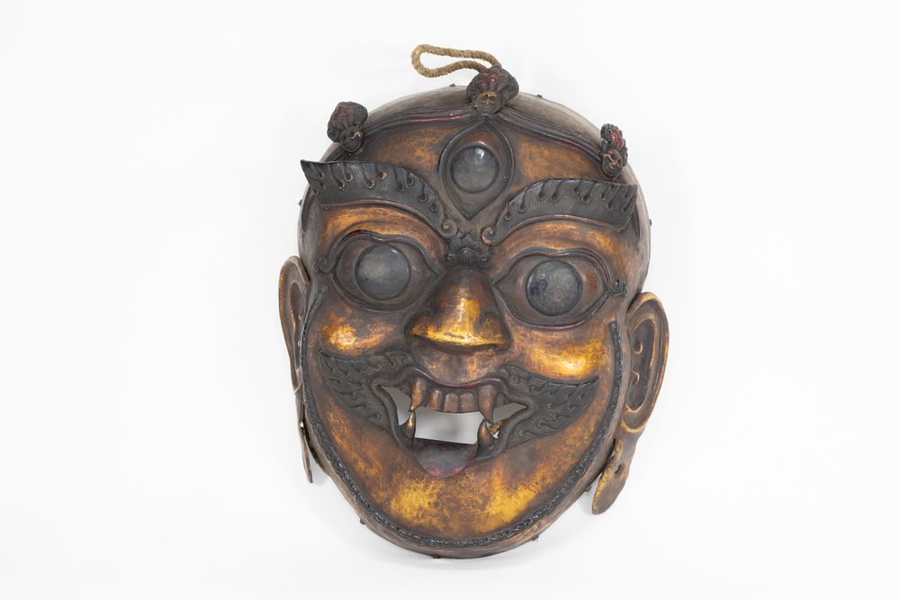 Lot 66: A Tribal Tibetan Bronze Buddhist Wall Hanging Mask...