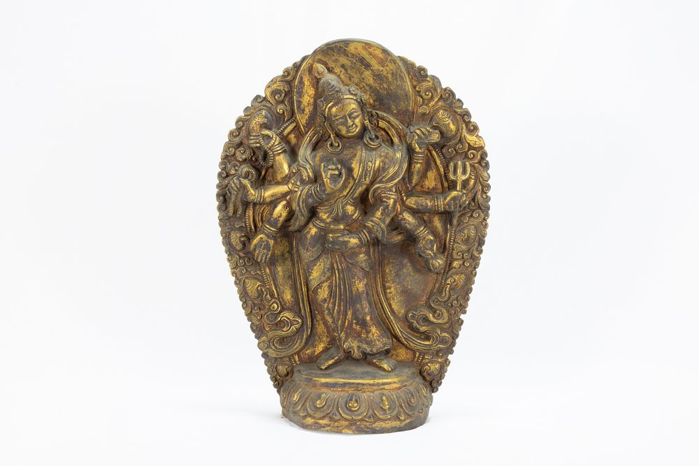 Lot 69: A Rare Tibetan Bronze Gilt Plaque of an...