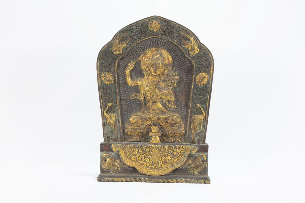 Lot 70: A Rare Tibetan Bronze Gilt Plaque of Manjushri...